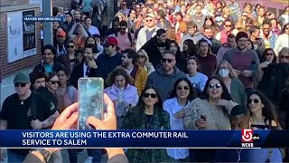 By train, car or broom: Ghoulish revelers flock to Salem