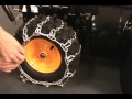 installing tire chains on a snow blower