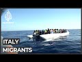 Hundreds of rescued migrants arrive in Italy