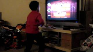 Koren playing Just Dance 2 on his Nintendo Wii