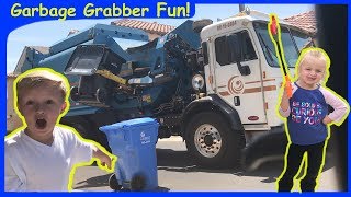 Kids Watch Garbage Trucks And Use Garbage Grabbers To Help Tree Trimmers
