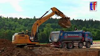 CATERPILLAR 324E LN Loads Tipper Trucks / Neubau B 14, Backnang, Germany, 18.05.2017.