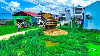 Bulldozer and Pour soil by Dump Trucks 5Ton Takes a full day to complete the job.by Size 5 x 25M