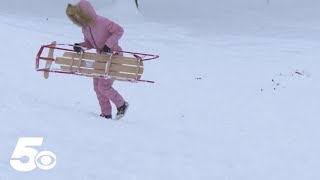 Fayetteville families take advantage of sledding opportunity