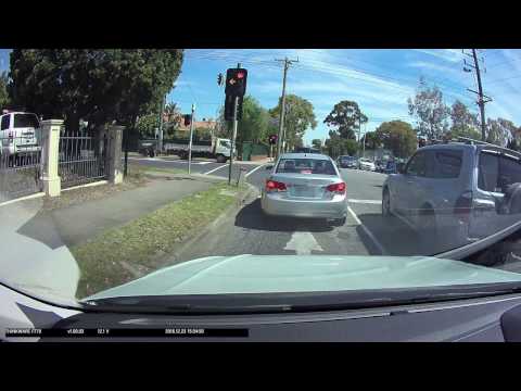 Idiot turning from wrong lane gets flashed by red light camera Idiot turning from wrong lane gets flashed by red light camera