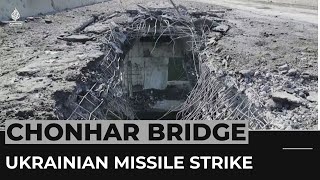 Russian officials say Ukraine missiles damage bridge to Crimea