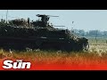 British Challenger 2 tanks seen in action as Ukrainian troops train for battle