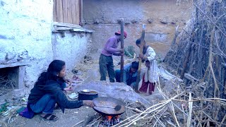 dharme brother's children are grinding paddy rice on the stone || primitive technology in village ||