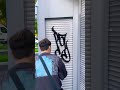 graffiti tag on a small gate