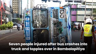 Seven people injured after bus crashes into truck and topples over in Bambalapitiya