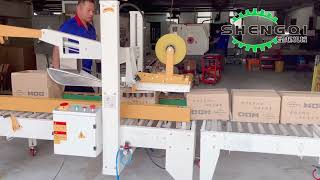 酒水饮料纸箱自动折盖封箱机齿科用品封箱机Automatic folding and sealing machine for liquor and beverage cardboard boxes