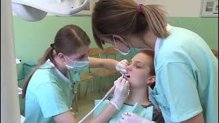 surgical mask and tight latex gloves for these dental girls