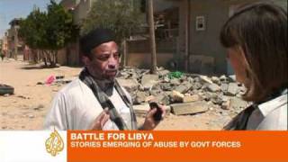 Gaddafi forces accused of torture