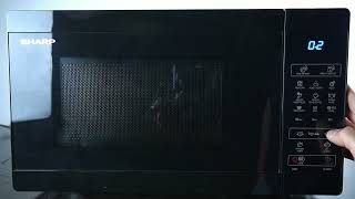 Microwave SHARP YC MG02E B - How to Defrost with Food Weight | Defrost by Weight