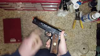 Airsoft WinGun 1911 review, specs, howto, cautions and info.