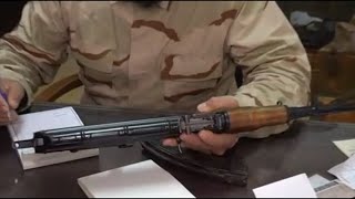 Former Assad forces hand in weapons in Syria | Raw video