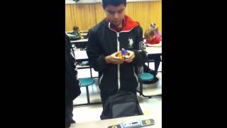 Kid Completes Rubiks Cube