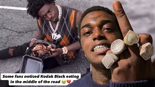 Kodak Black Spotted Eating Chicken in the Middle of the Road?! Fans React to His Wild Eating Habits