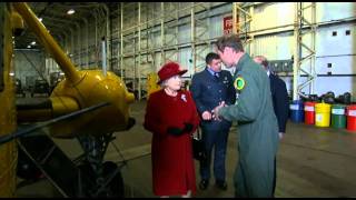 Prince William shows Queen Elizabeth II an RAF Search and Rescue helicopter
