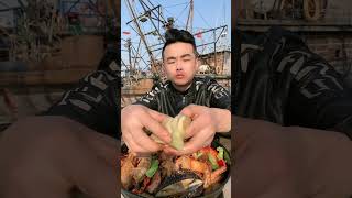 Fishermen's eating delicious seafood (Octopus, king crab, lobster, oyster, shrimp, scallop)