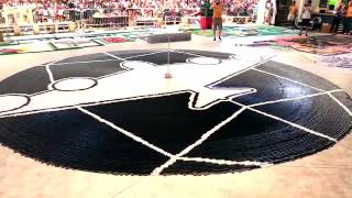 Most dominoes toppled in circle      Guinness world record