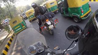 Trying to navigate a Delhi roundabout on a Royal Enfield motorbike!