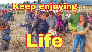 drum circle on Venice Beach California  keep enjoying life