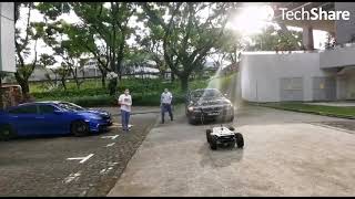 無人走行ロボット（UGV） SCOUT 2.0 で BMWを牽引