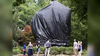 Black covers draped over Confederate statues in Charlottesville