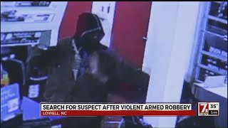 Search for suspect in violent armed robbery