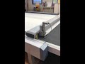 video of the bandalux state of the art machine cutting the fabric to manufacture a roller shade