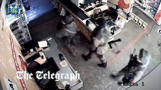 Ukraine war: CCTV footage appears to show Russian soldiers break in and loot supermarket in Sumy