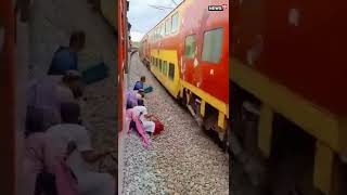 Railway Track Ruckus: Passengers Cross Seconds Before Train's Arrival | #Shorts