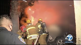 Fiery crash caught on camera as car flies into embankment near downtown LA freeway | ABC7