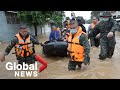 Typhoon Vamco: Rescuers evacuate trapped residents in flood-hit Philippines