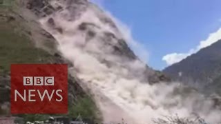Nepal Earthquake: Land slide caught on camera - BBC News