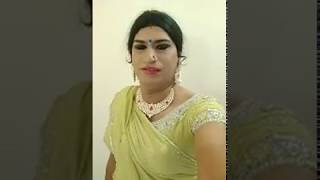 beautiful Indian crossdresser in yellow saree