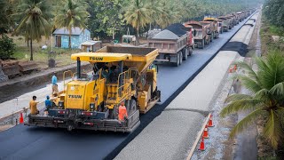 Advanced paving machine spreading fresh gravel on roads with multiple dump trucks delivering gravel