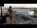 violinist marta z performs sunset balcony concert for neighbors can t help falling in love