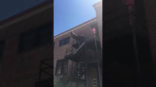 Throwing a couch off a a balcony