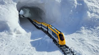 Lego Train travels through Snow Tunnel