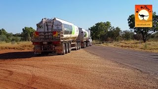 Roadtrain reversing into difficult roadway