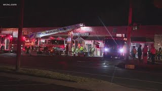 Three-alarm fire rips through NW Charlotte businesses