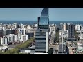 video aéreo de aguada park y la torre de antel con vista al sur de la ciudad de montevideo. m3 16570