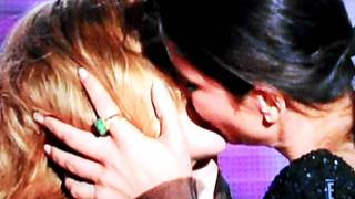 Sandra Bullock kissing Scarlett Johanson