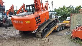 LOADING BRAND NEW HITACHI EXCAVATOR.