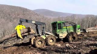 John Deere 768 Two staging Heavy WV hardwood to the Landing