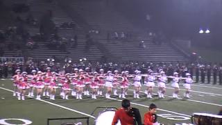 Northwest HS Sidekicks perform in the rain.