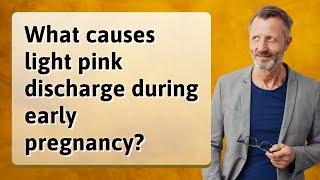 What causes light pink discharge during early pregnancy?