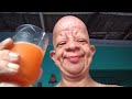 bald wrinkly guy drink orange juice moan